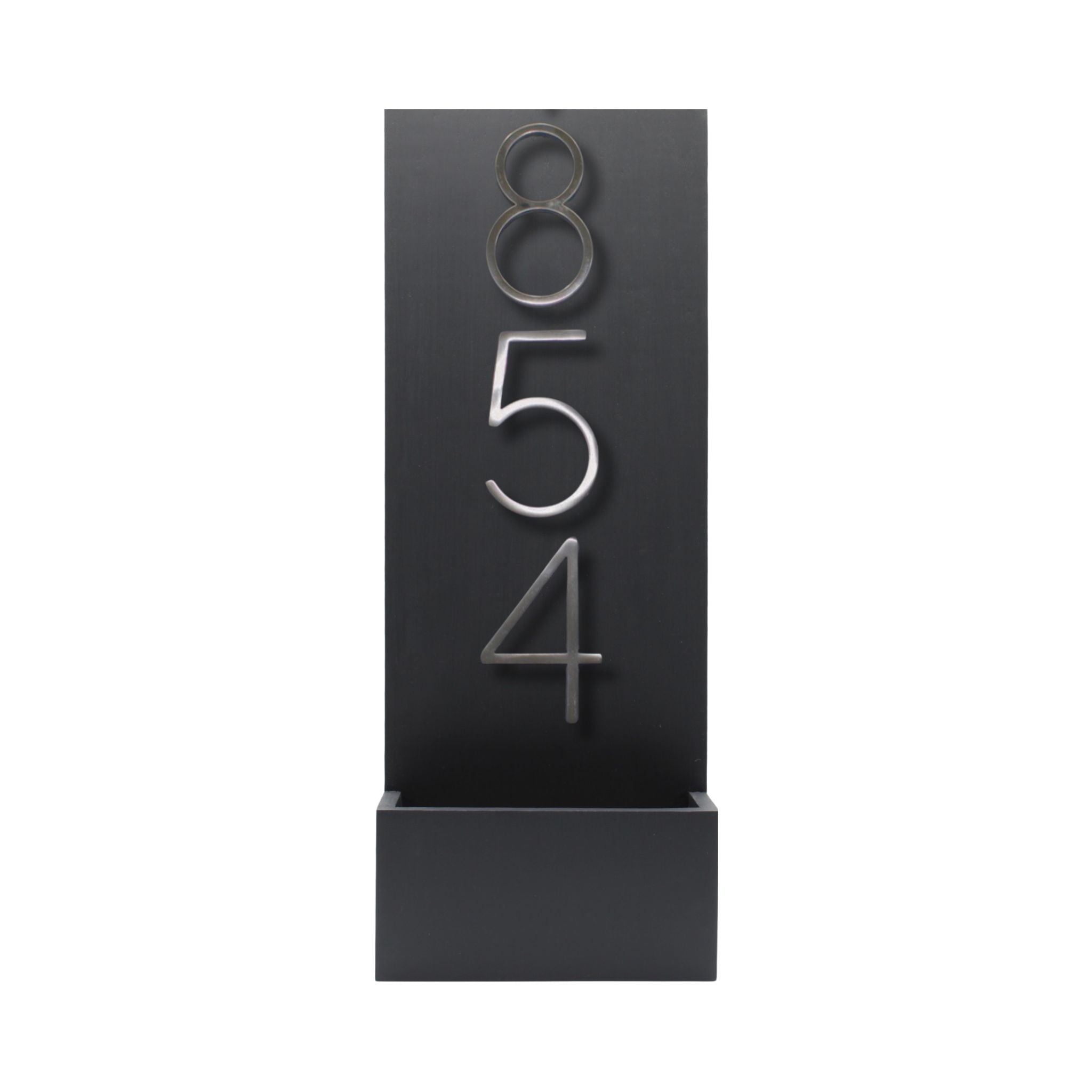 Black vertical modern house number sign featuring raised silver numbers 854.