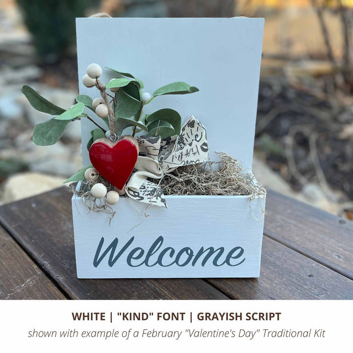 white interior custom personalized sign with welcome or name shown with traditional Valentine's Day kit decor available on a subscription basis
